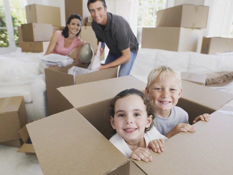 A happy family preparing for a move in Barnet