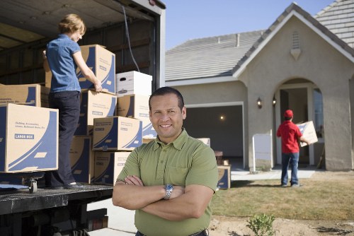 Efficient moving team packing furniture securely