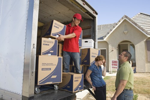 Professional movers in Barnet organizing furniture
